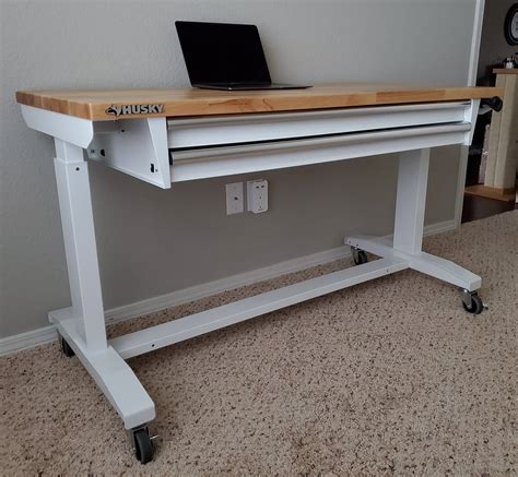 Home depot standing desk - Our sit stand electronic desk features a generous 55.1 in. x 23.6 in. surface area, providing you with enough working space for a desktop computer, monitor, laptop, keyboard, mouse and other office accessories.